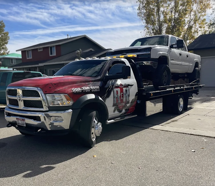 R&R Towing flatbed with vehicle
